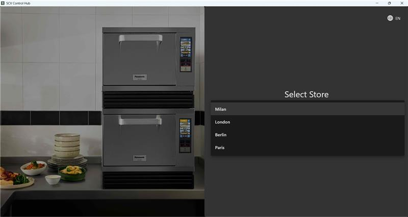 Two stacked Panasonic NE-SCV3N ovens are shown on the left side of the screen, while the SCV Control Hub app displays a “Select Store” menu on the right with the options.