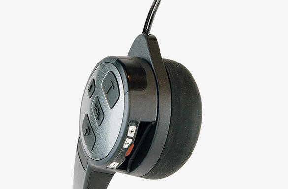 Black headset with integrated control buttons on a white background.