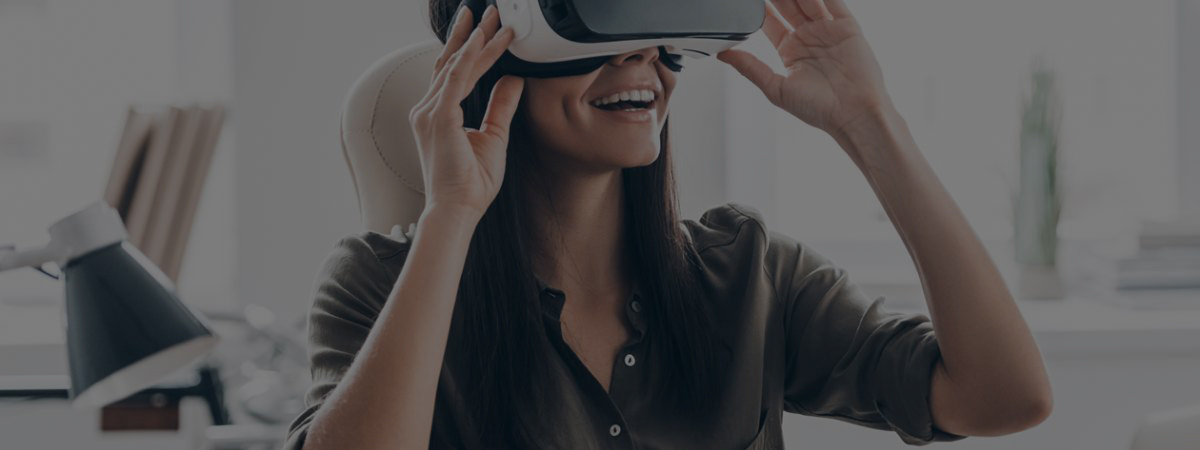 A woman wears a VR headset