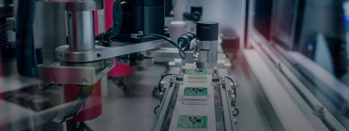 An industrial machine manufactures microchips