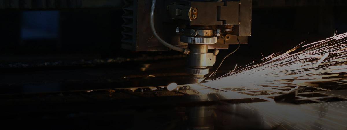 Sparks fly from an industrial machine