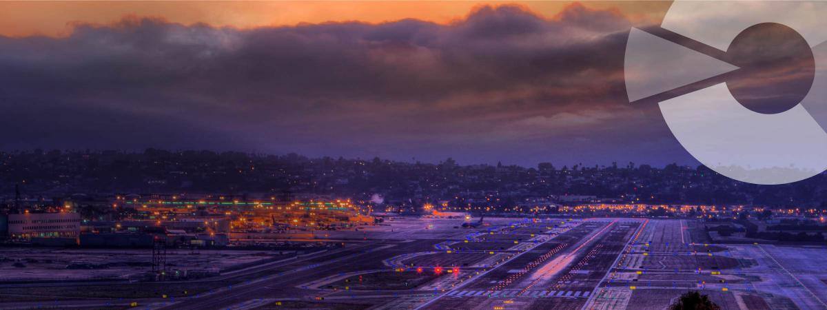 An airport tarmac at dusk