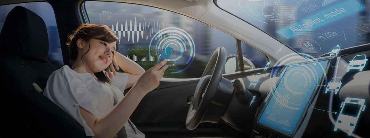 A driver looks at their phone