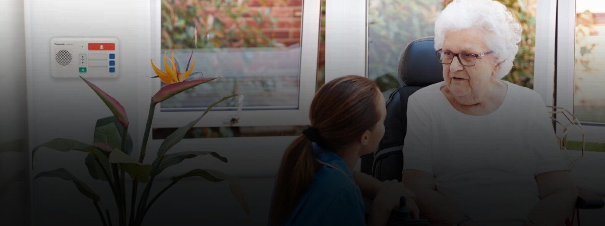 A nurse talks to a senior