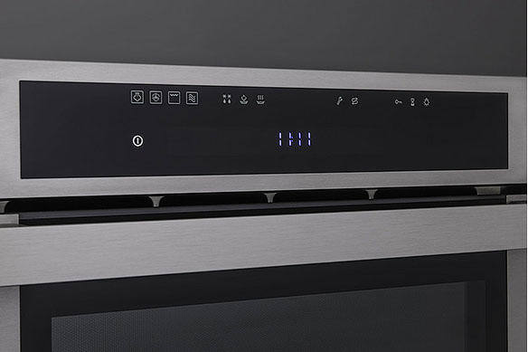 Close-up of a built-in oven's digital control panel.