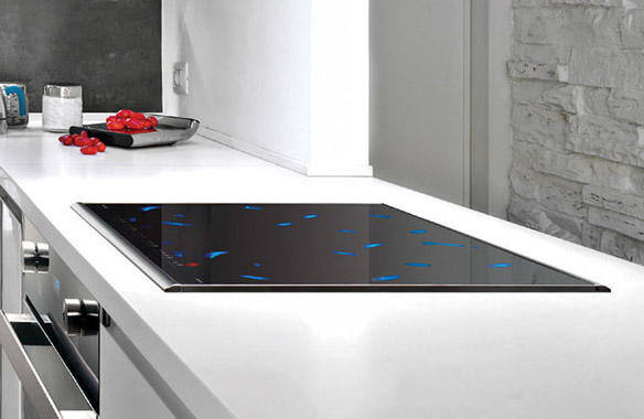 Sleek induction cooktop installed in a modern kitchen counter.