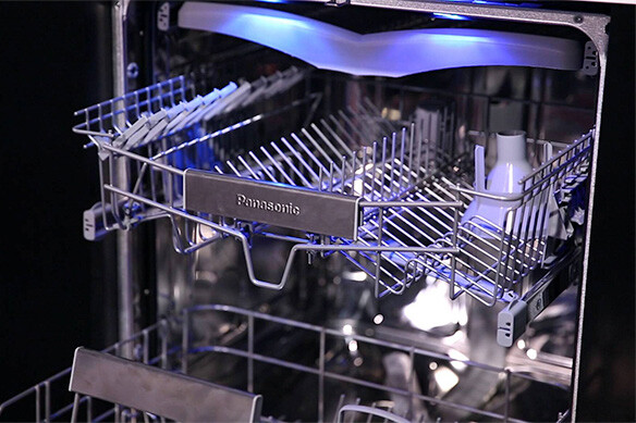 Panasonic dishwasher with door open and drawers extended to show interior