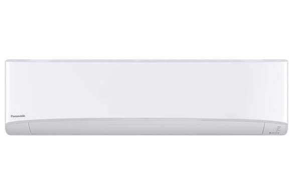 White Panasonic air conditioning unit on a plain background.