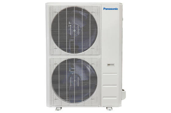 Unité de pompe à chaleur extérieure Panasonic blanche avec deux ventilateurs.