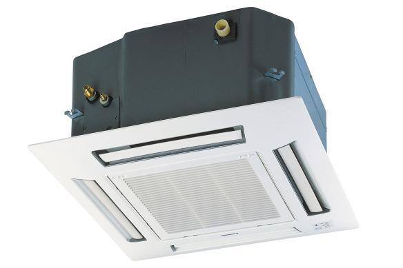 Unité de climatisation intérieure montée au plafond avec une calandre blanche.
