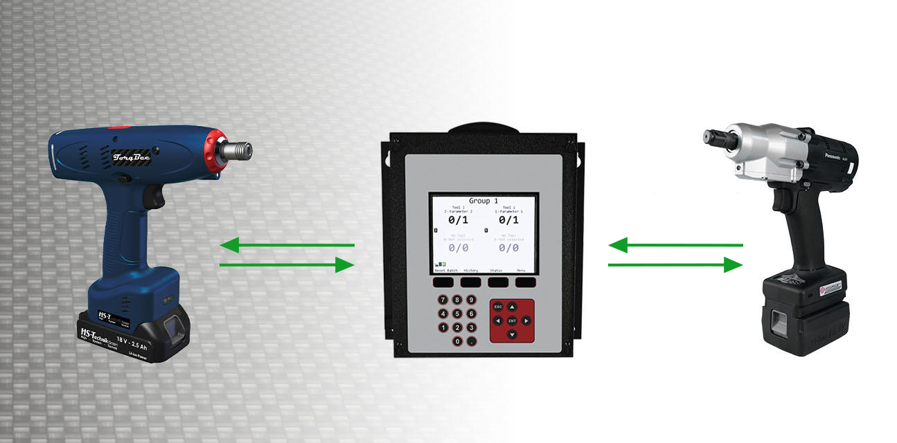 Two drills next to a control console with green arrows indicating 2-way communication