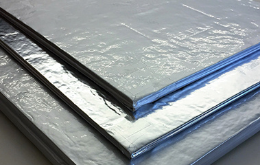 Three vacuum insulation panels stacked on top of eachother