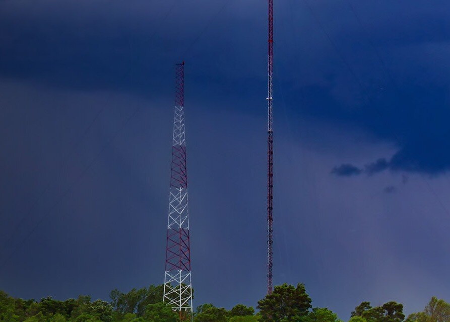 GPS tower next to lightning tower