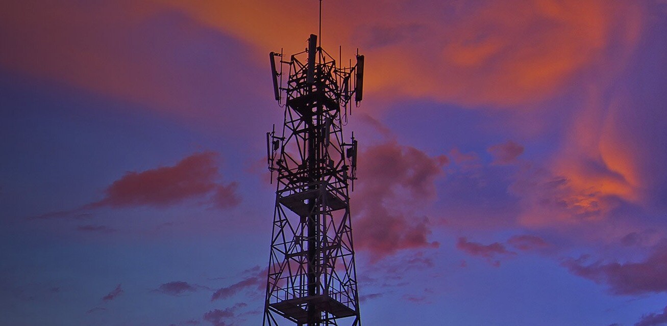 A GPS tower at sunset