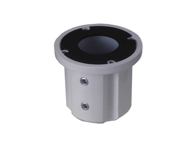 Cylindrical metal mount with a flanged top and side screws.
