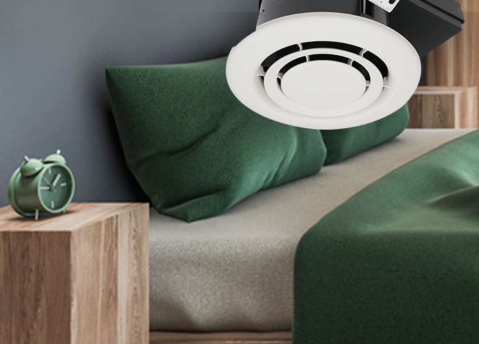 Ceiling-mounted air purifier in a modern bedroom setting.