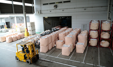 A forklift in a recycling plant