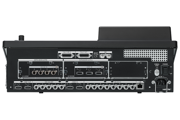 Black professional video production switcher with multiple ports and controls.